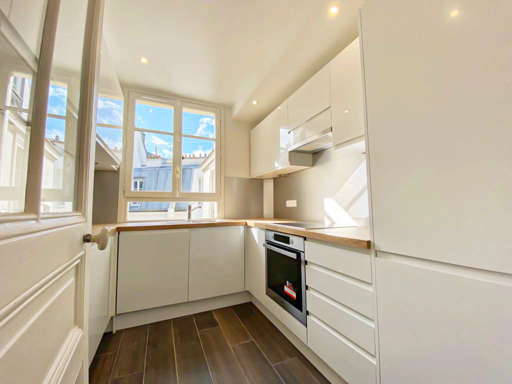 Réhabilitation d'un appartement haussmannien à neuf par un architecte d'intérieur (cuisine)